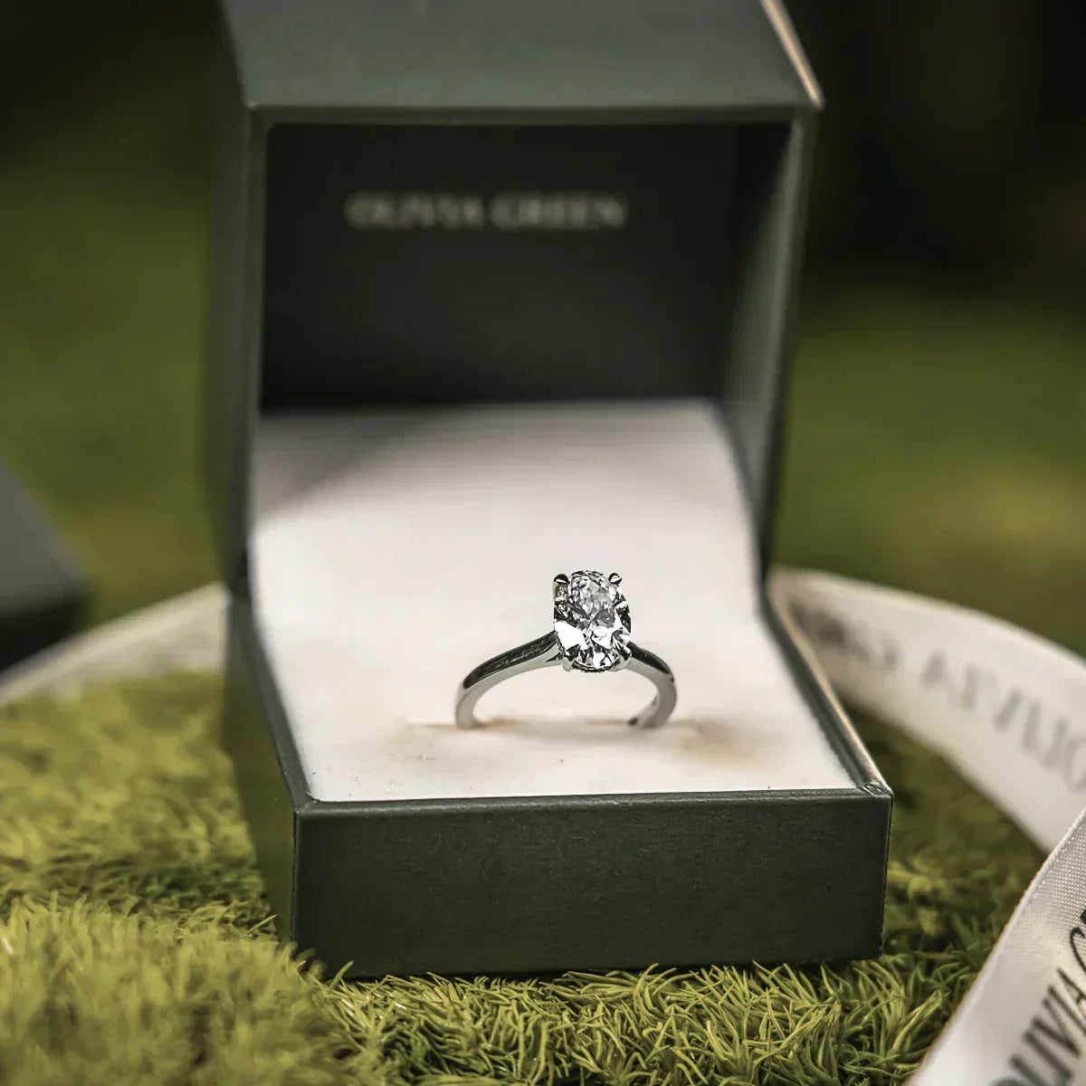 platinum engagement rings displayed on marble