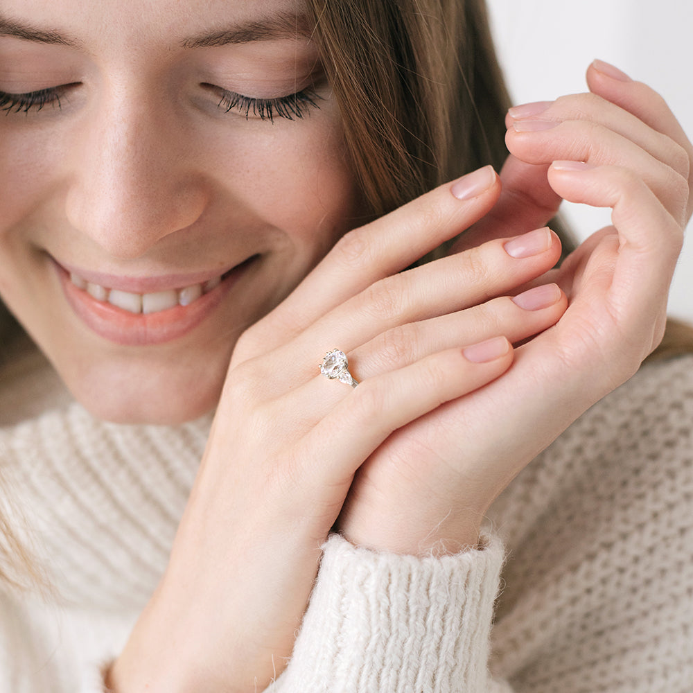 a woman holding a cell phone to her ear