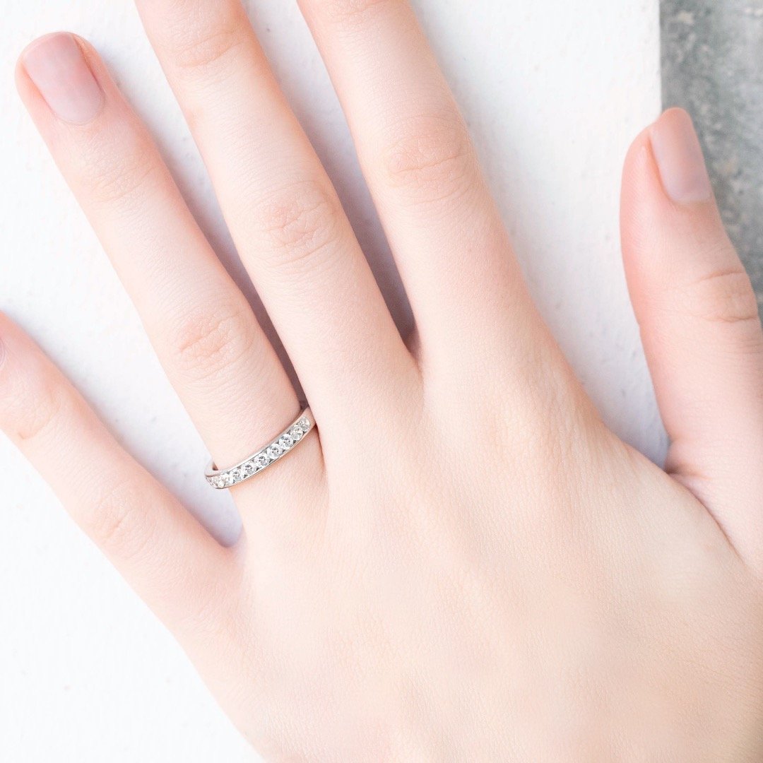 a close up of a person holding a pair of scissors