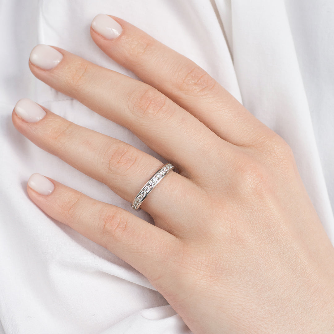 a person holding a cell phone in their hand