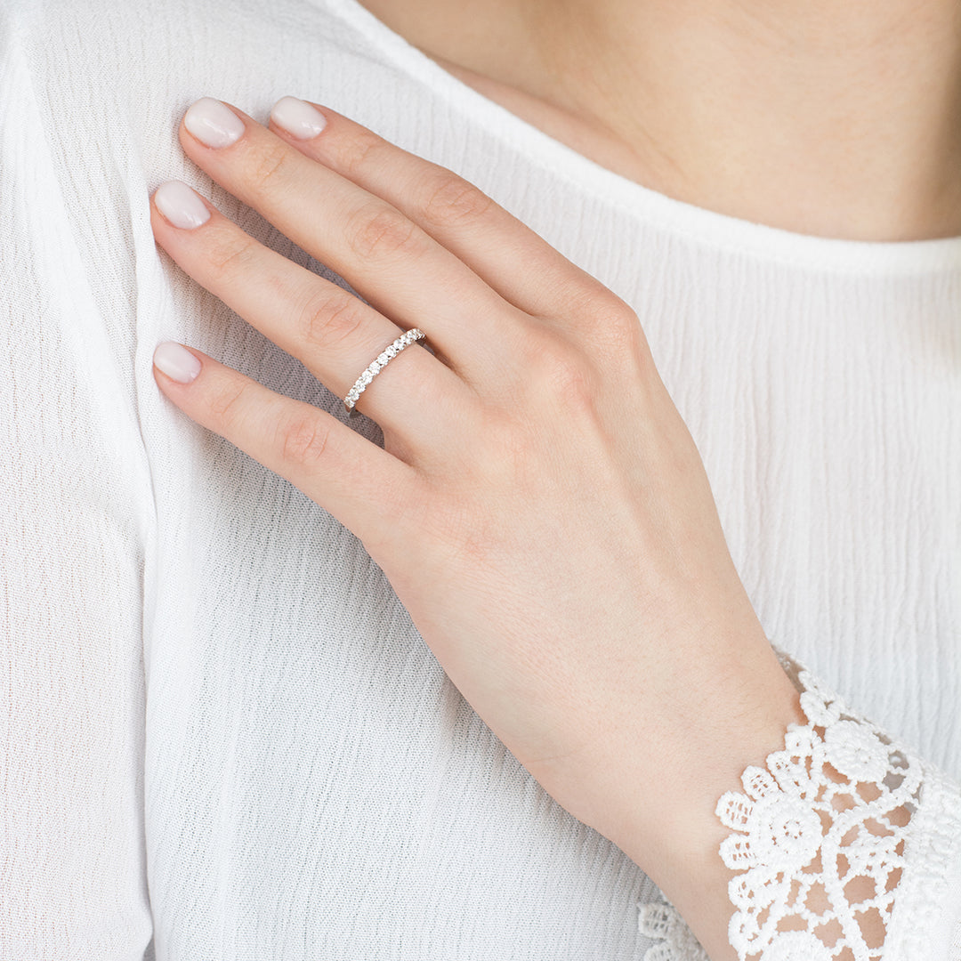a close up of a person holding a pair of scissors