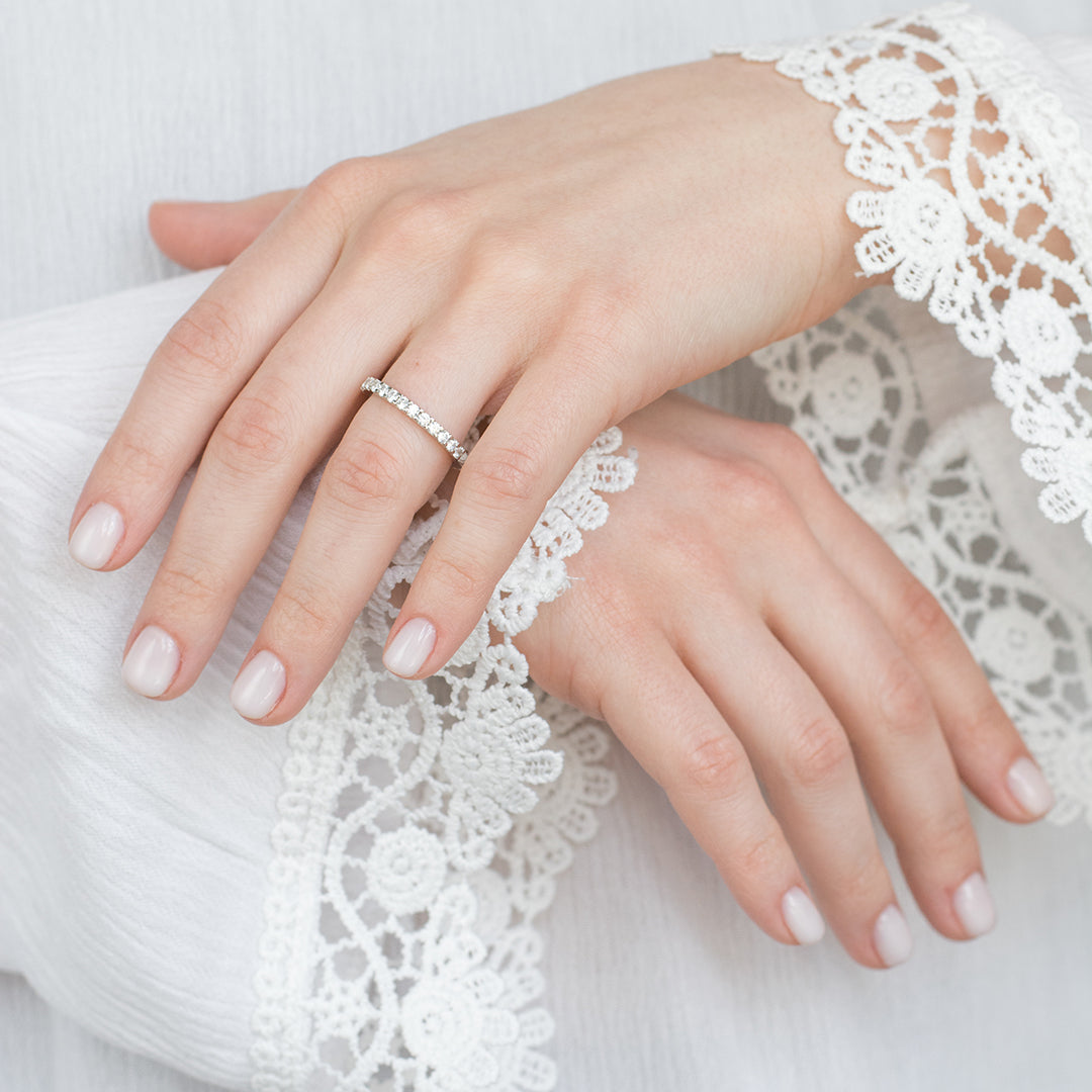 a person is holding a pair of scissors