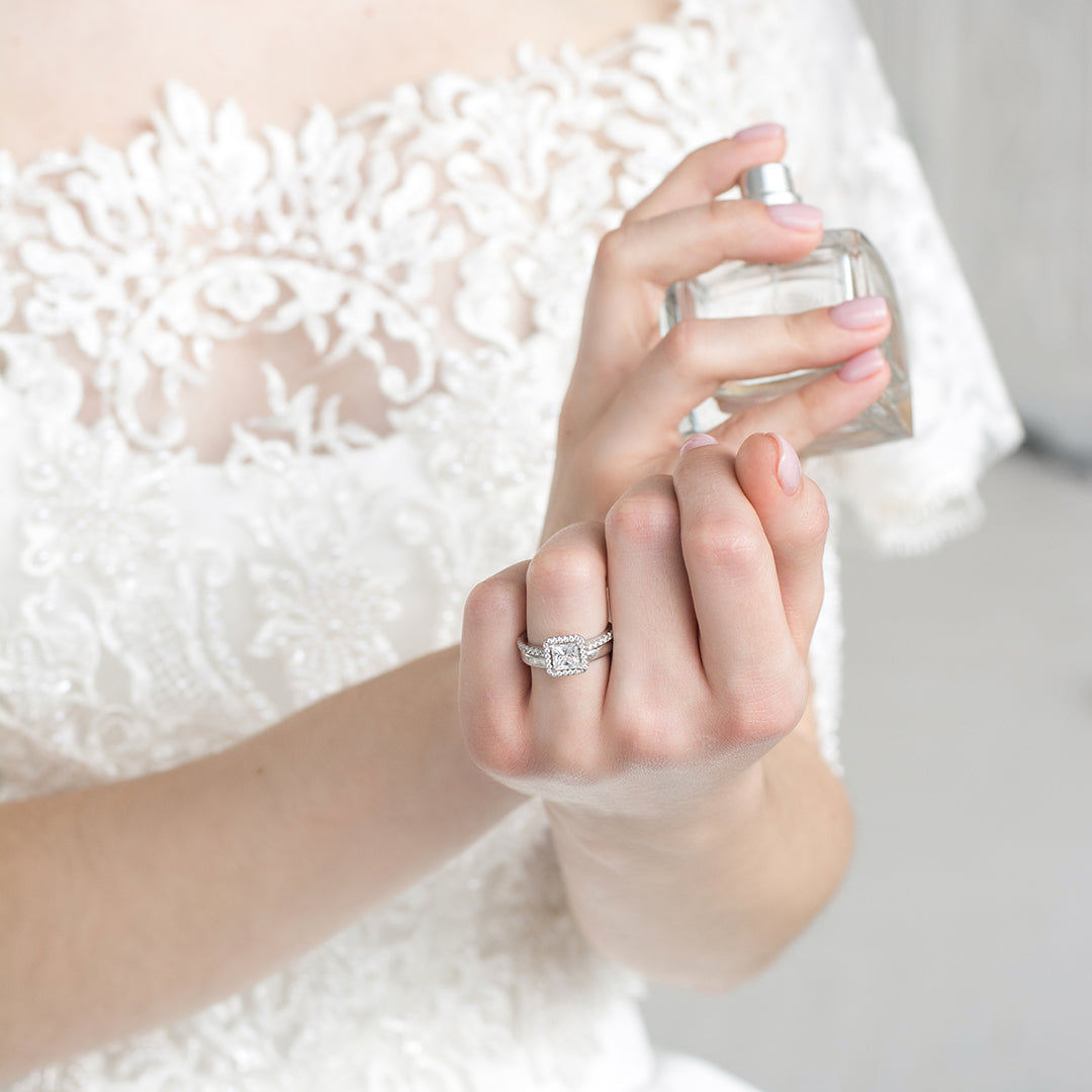 a person holding a cell phone in their hand