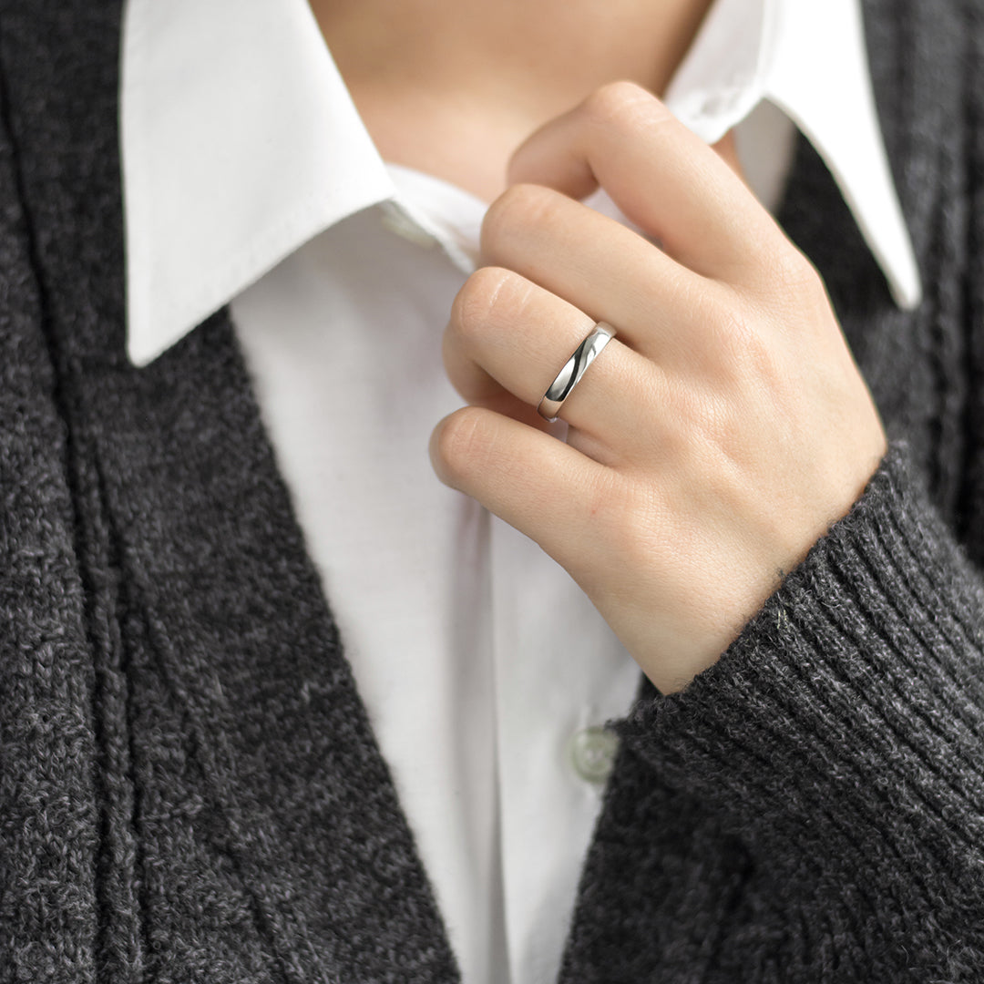 a person wearing a tie and a tie