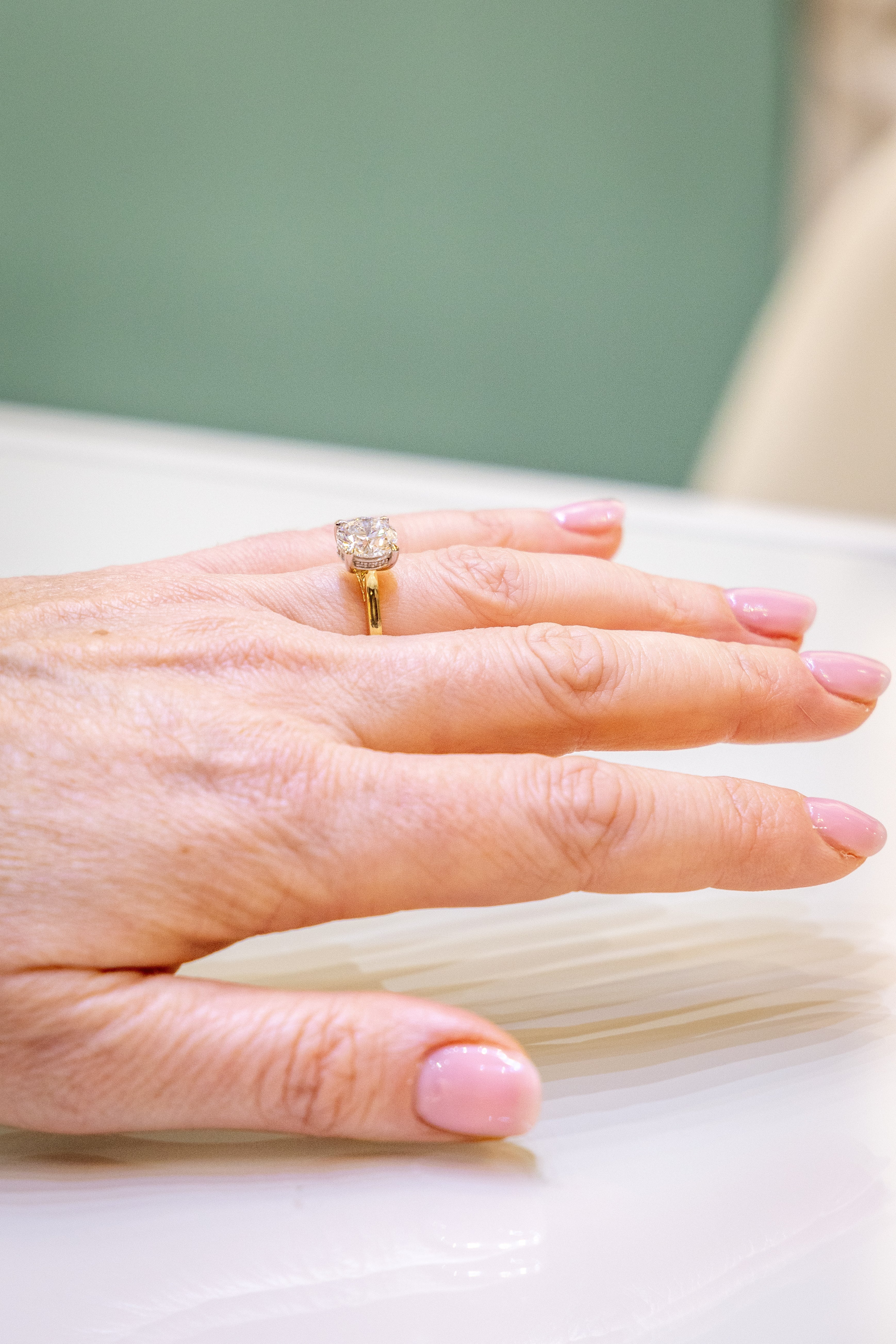A tray of 18 ct gold rings, necklaces and earrings at Olivia Green