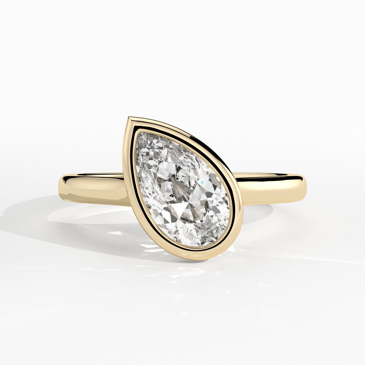 New-Bezel Pear Off 1ct 18YG