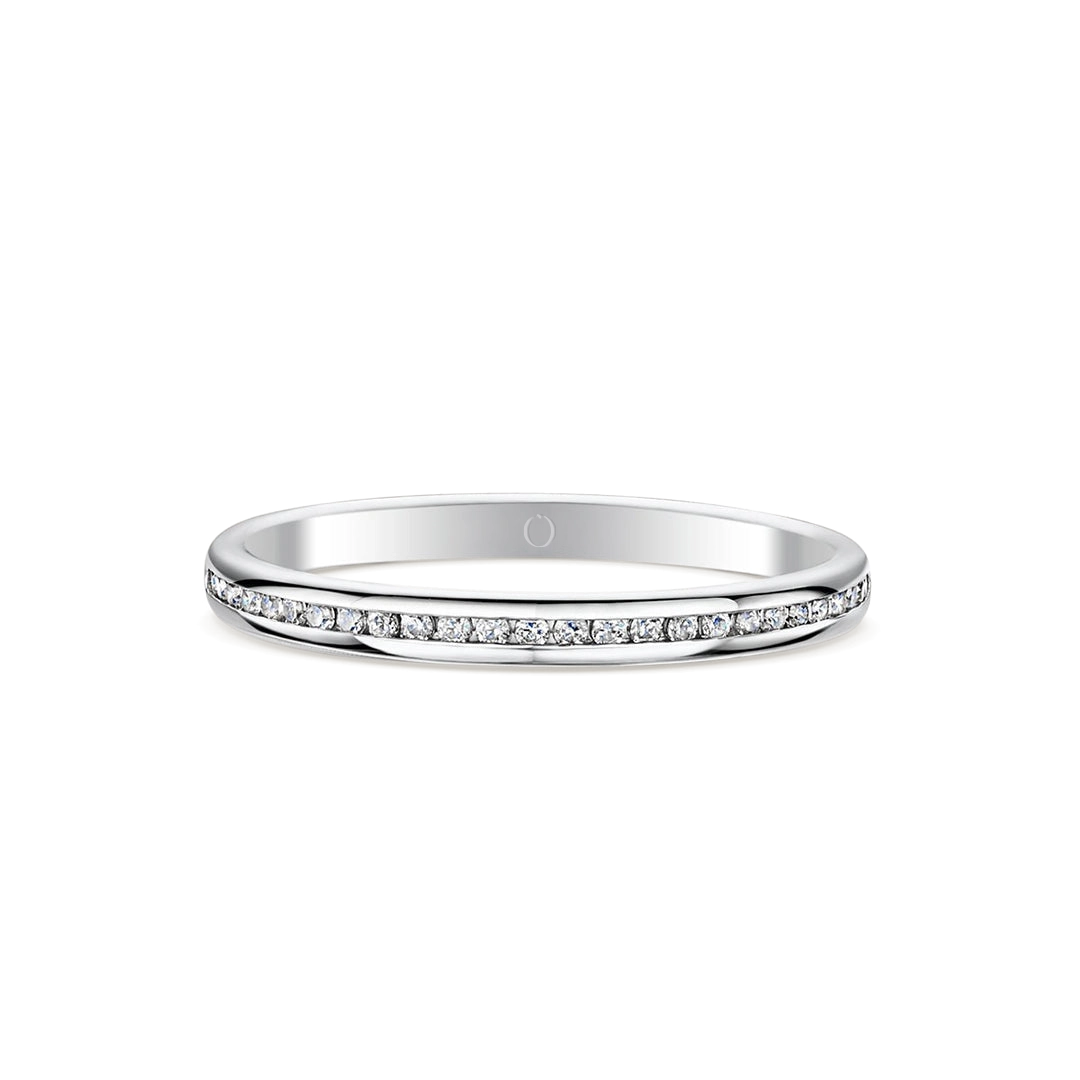 Olivia Green Platinum Diamond wedding ring with a round cut diamonds 0.15 carat  laying flat